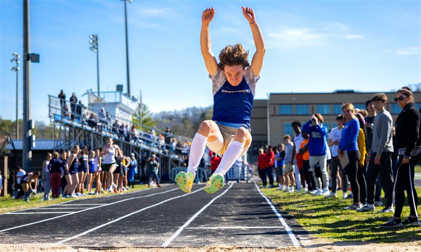 A student participates in the long jump